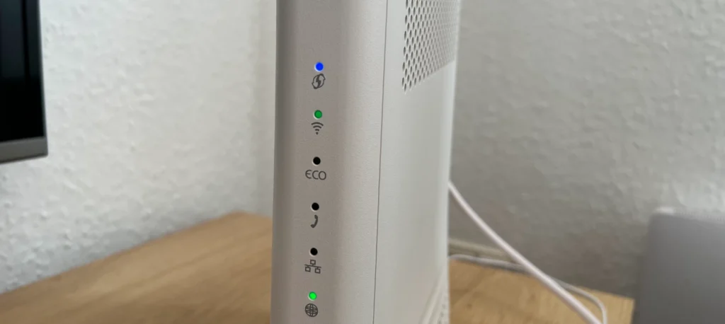 Router med lysende WPS-knap
